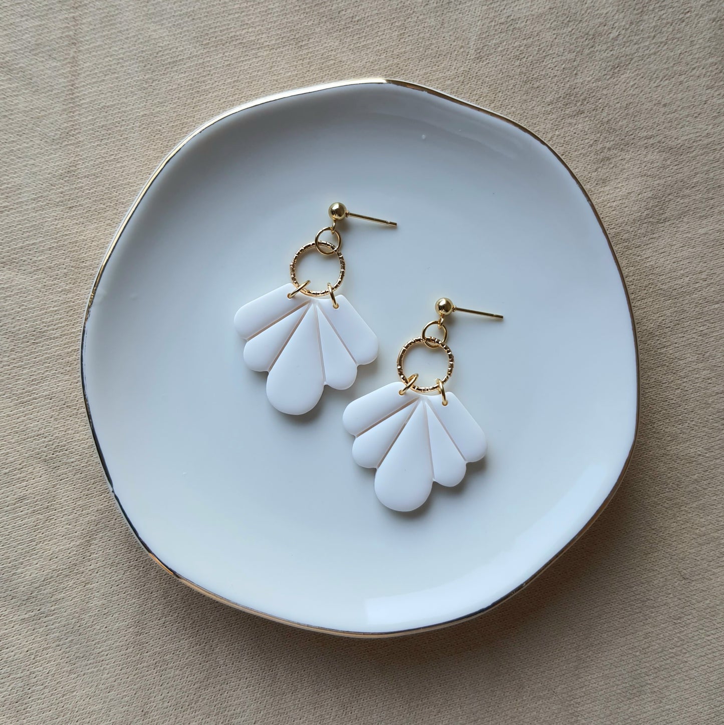 White fan dangle earrings