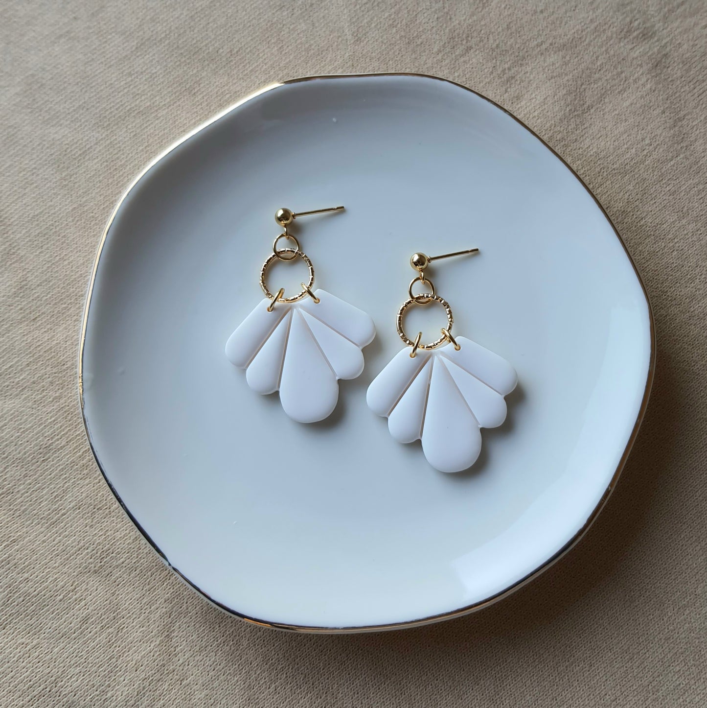 White fan dangle earrings