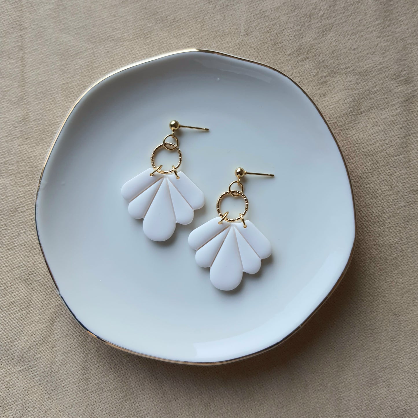White fan dangle earrings