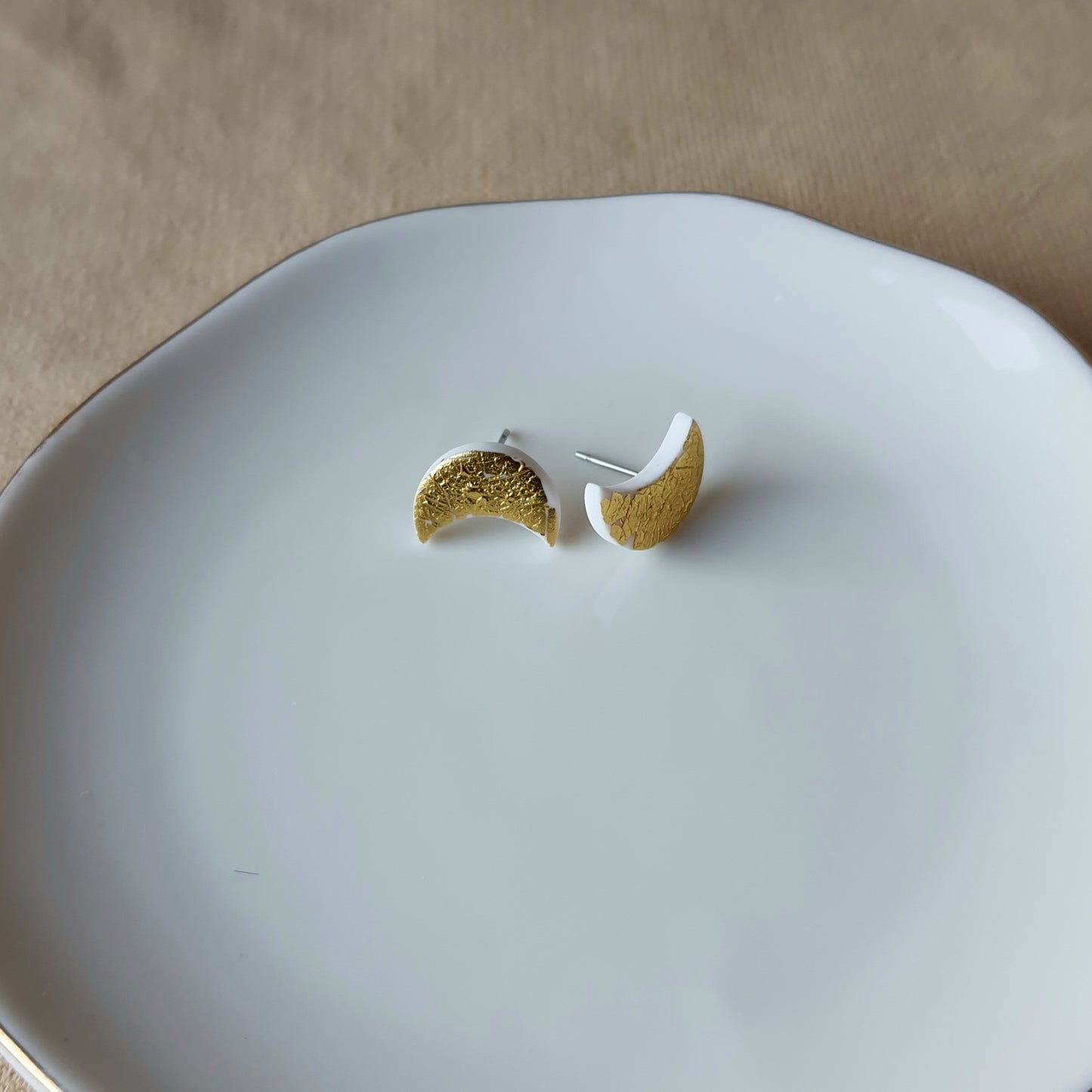 White moon with golden flakes stud earrings
