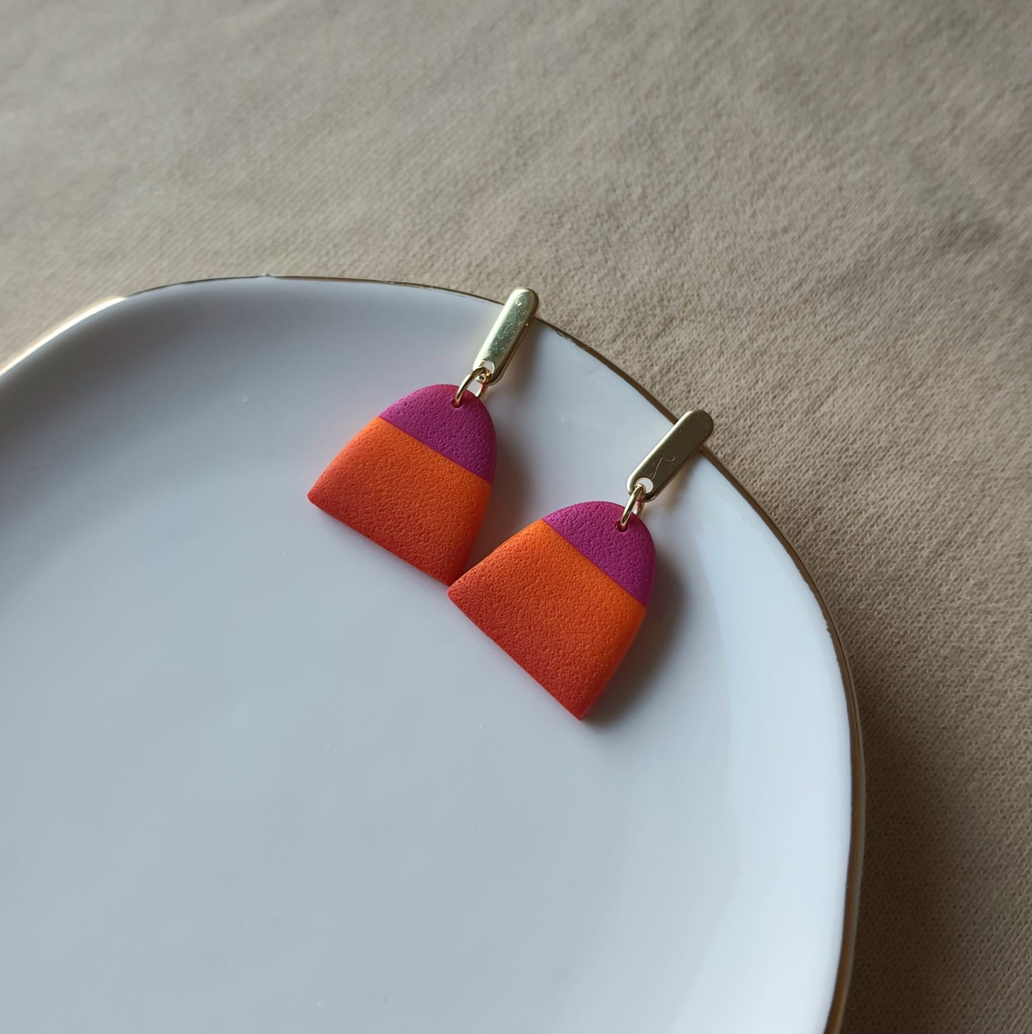 Magenta and orange dangle earrings