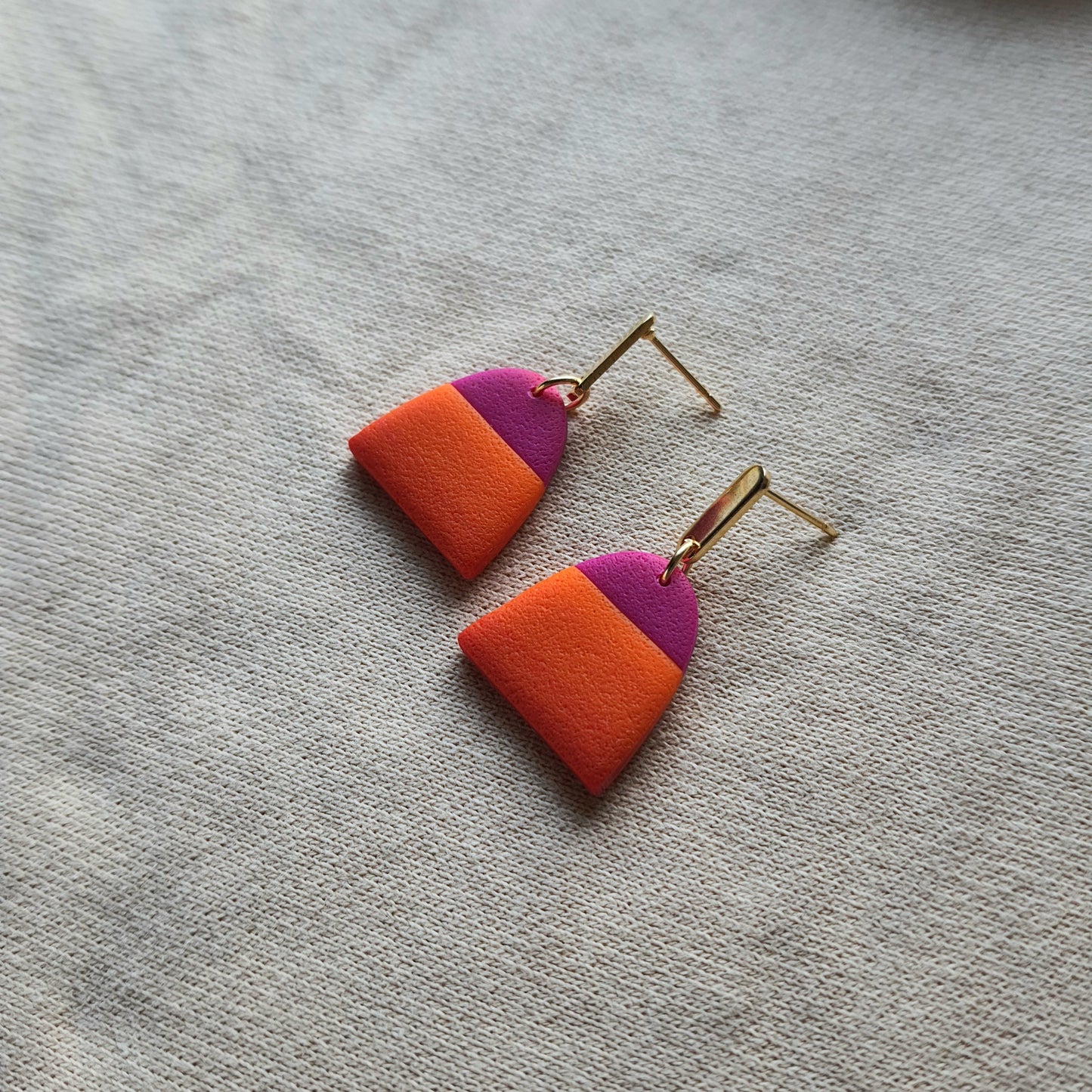Magenta and orange dangle earrings