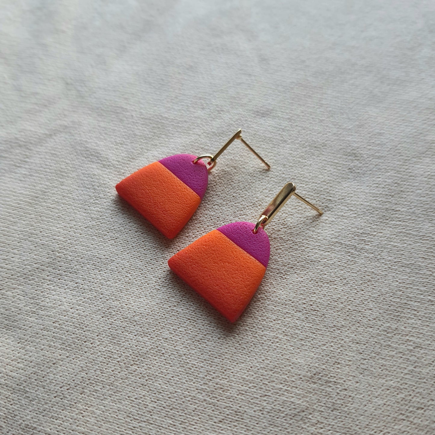 Magenta and orange dangle earrings