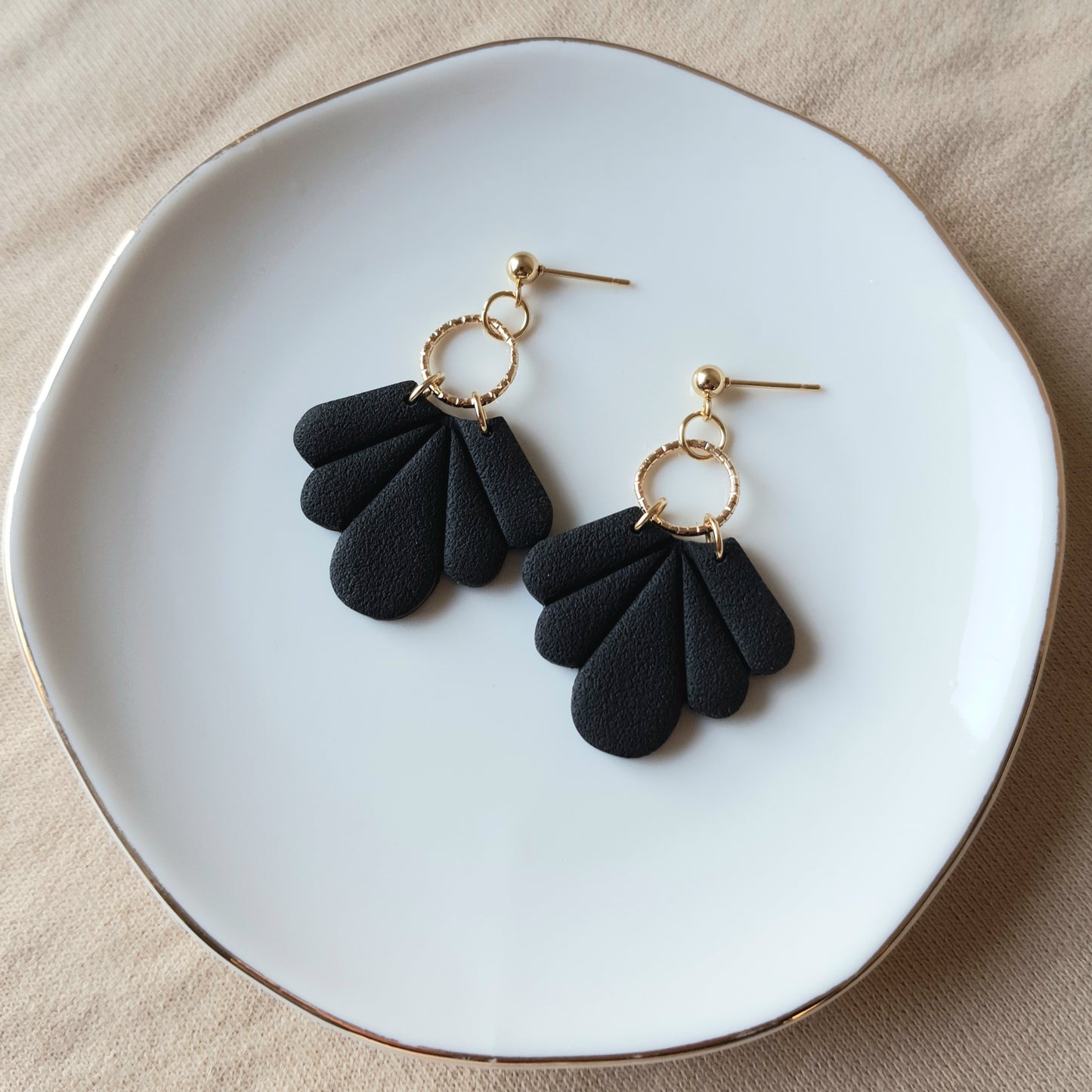 Black fan dangle earrings