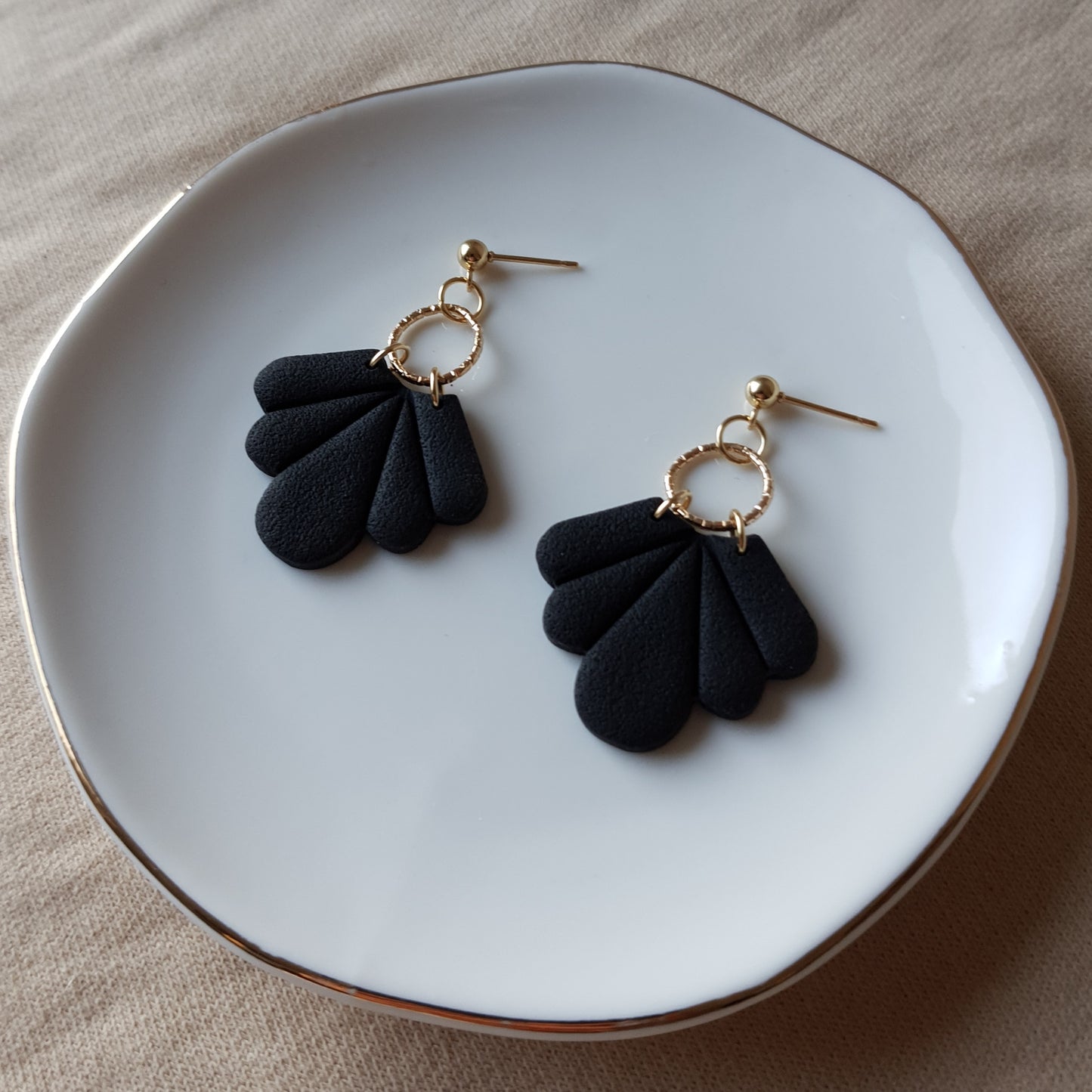 Black fan dangle earrings