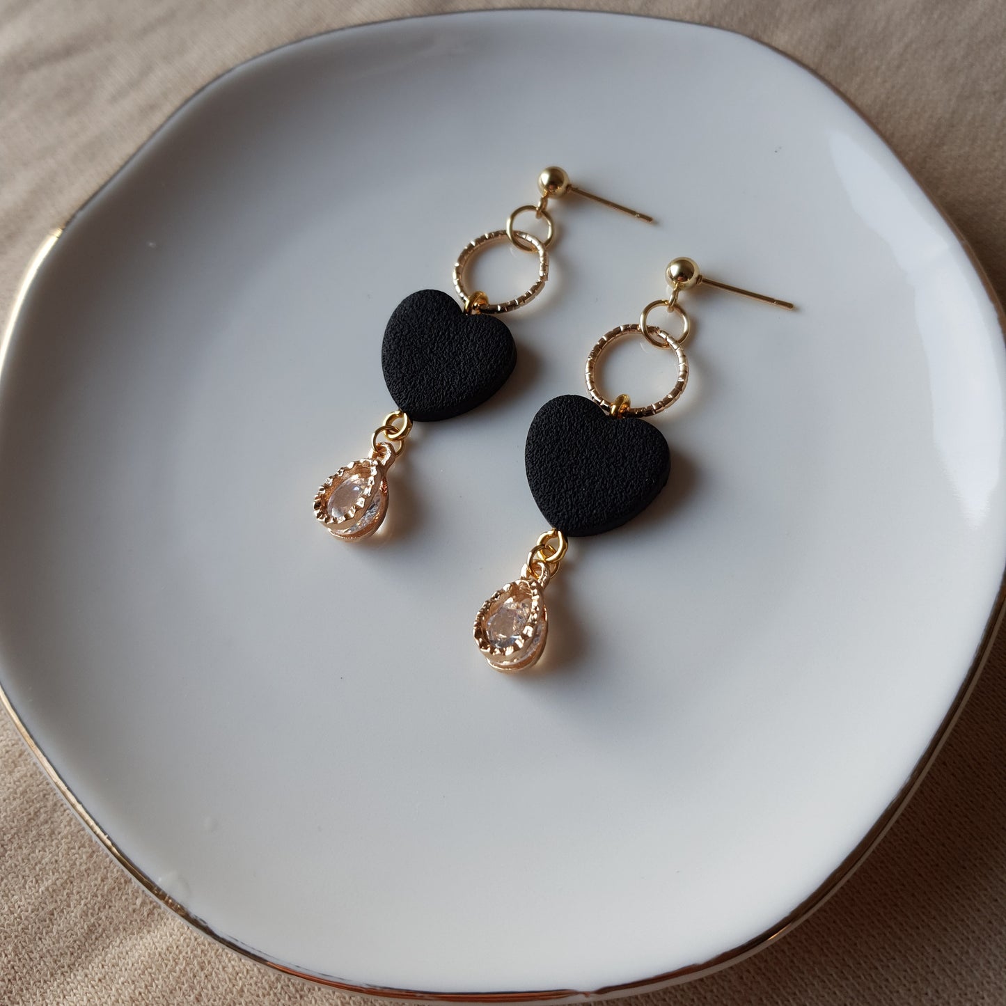 Black heart dangle earrings