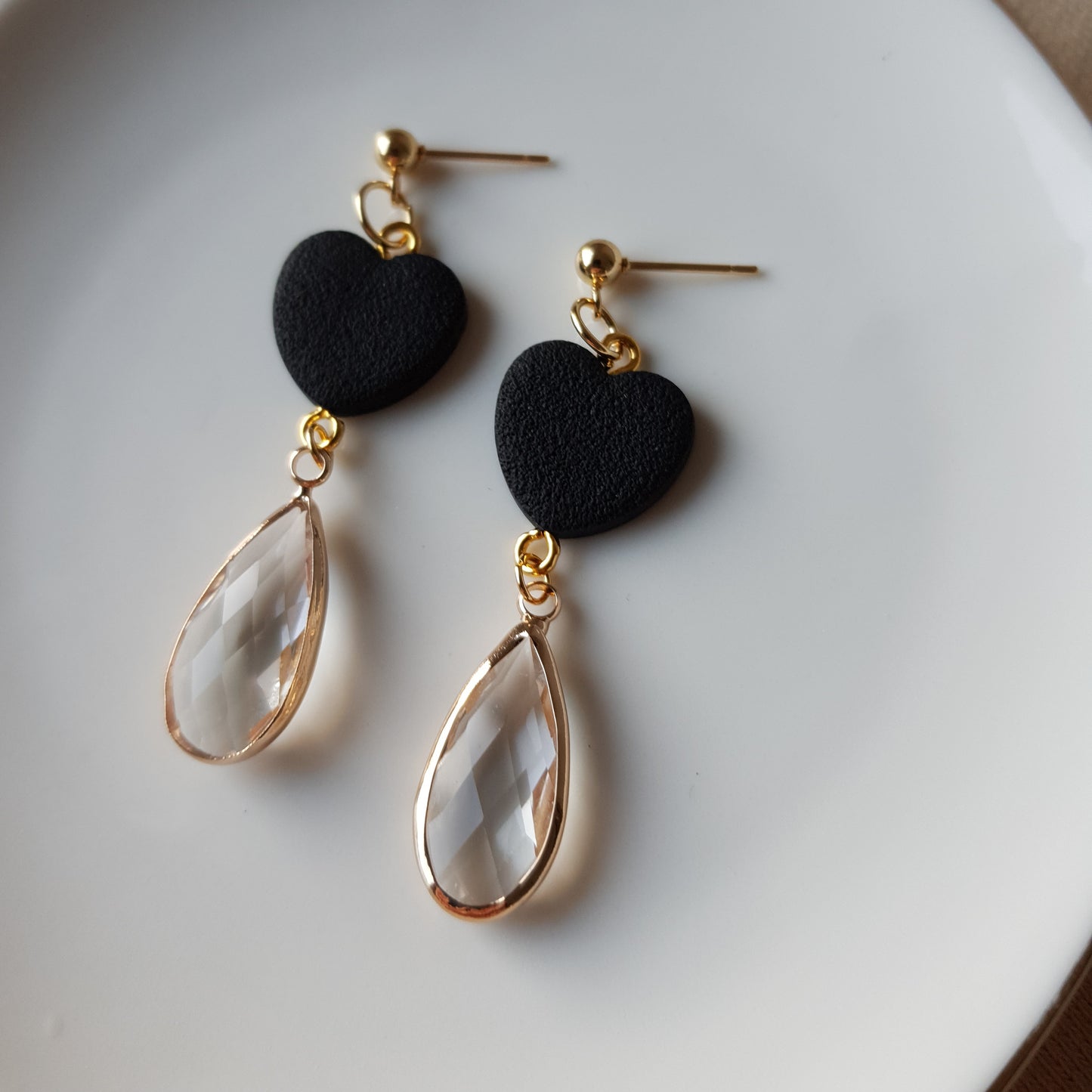 Black heart dangle earrings