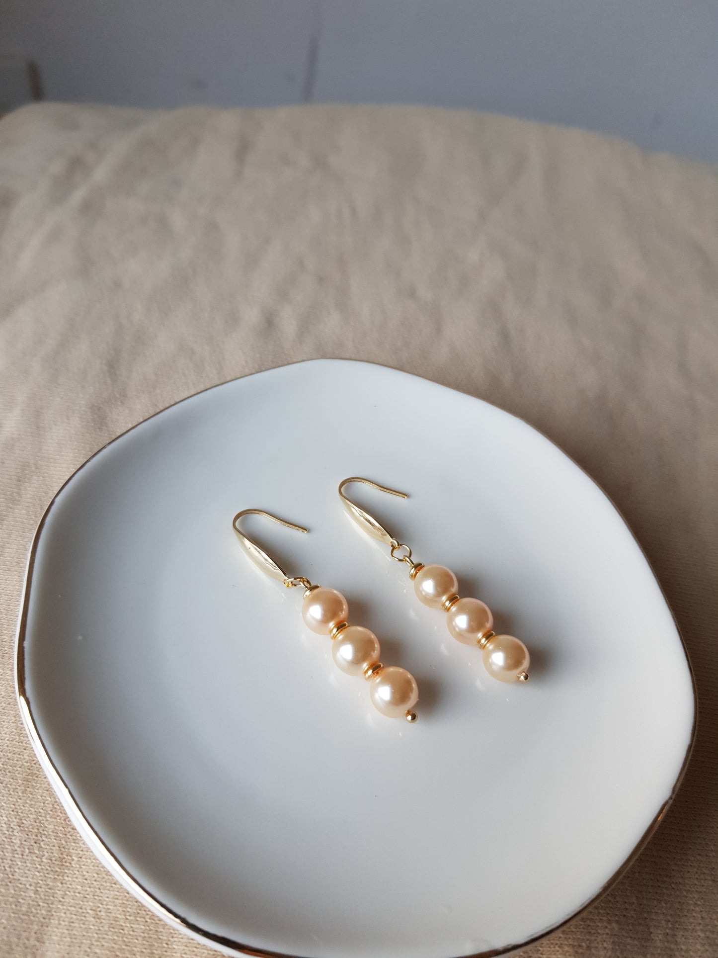 Salmon pearl bead dangle earrings