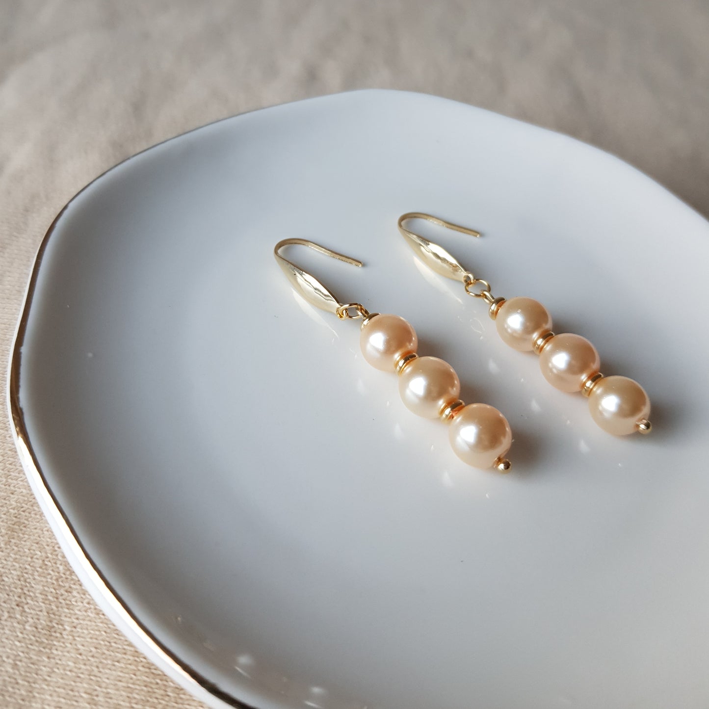 Salmon pearl bead dangle earrings
