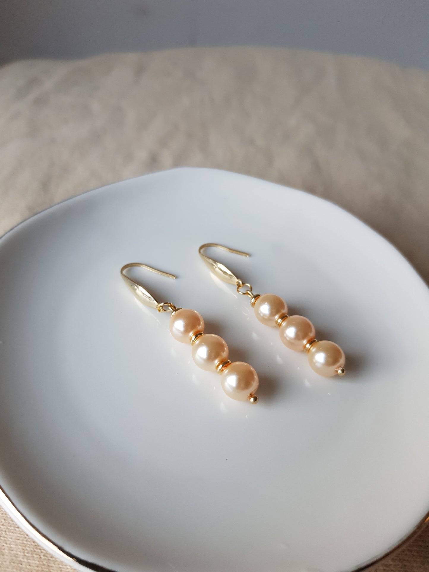 Salmon pearl bead dangle earrings
