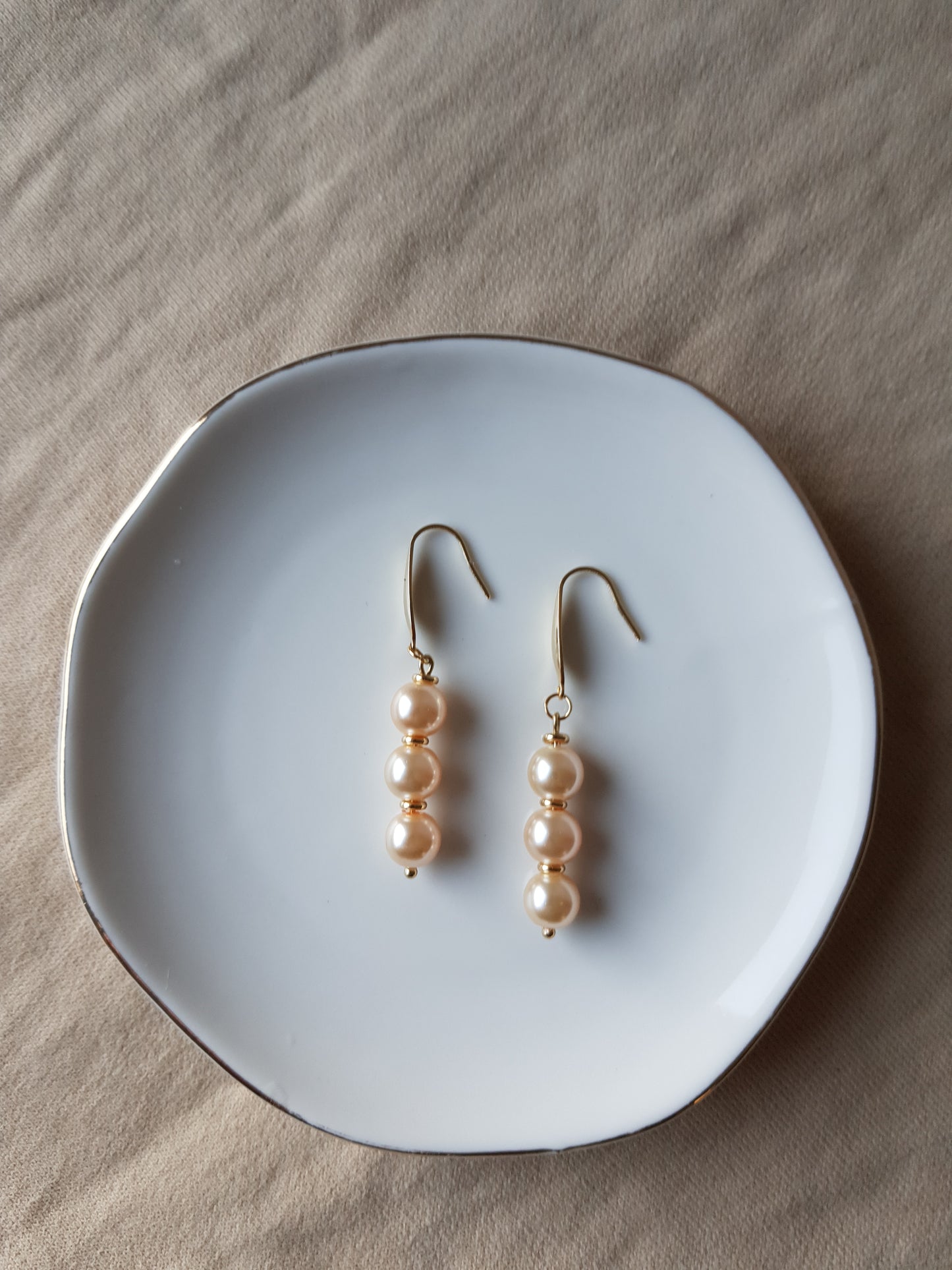 Salmon pearl bead dangle earrings