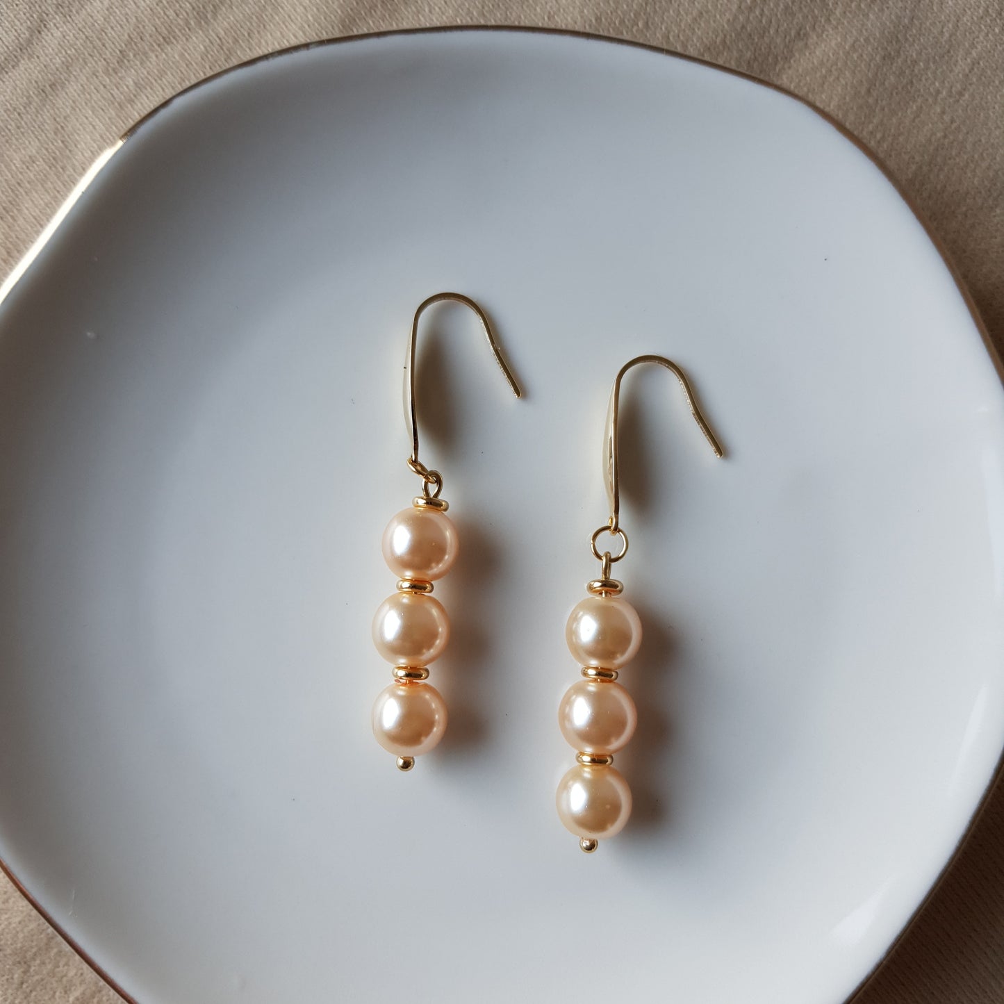 Salmon pearl bead dangle earrings