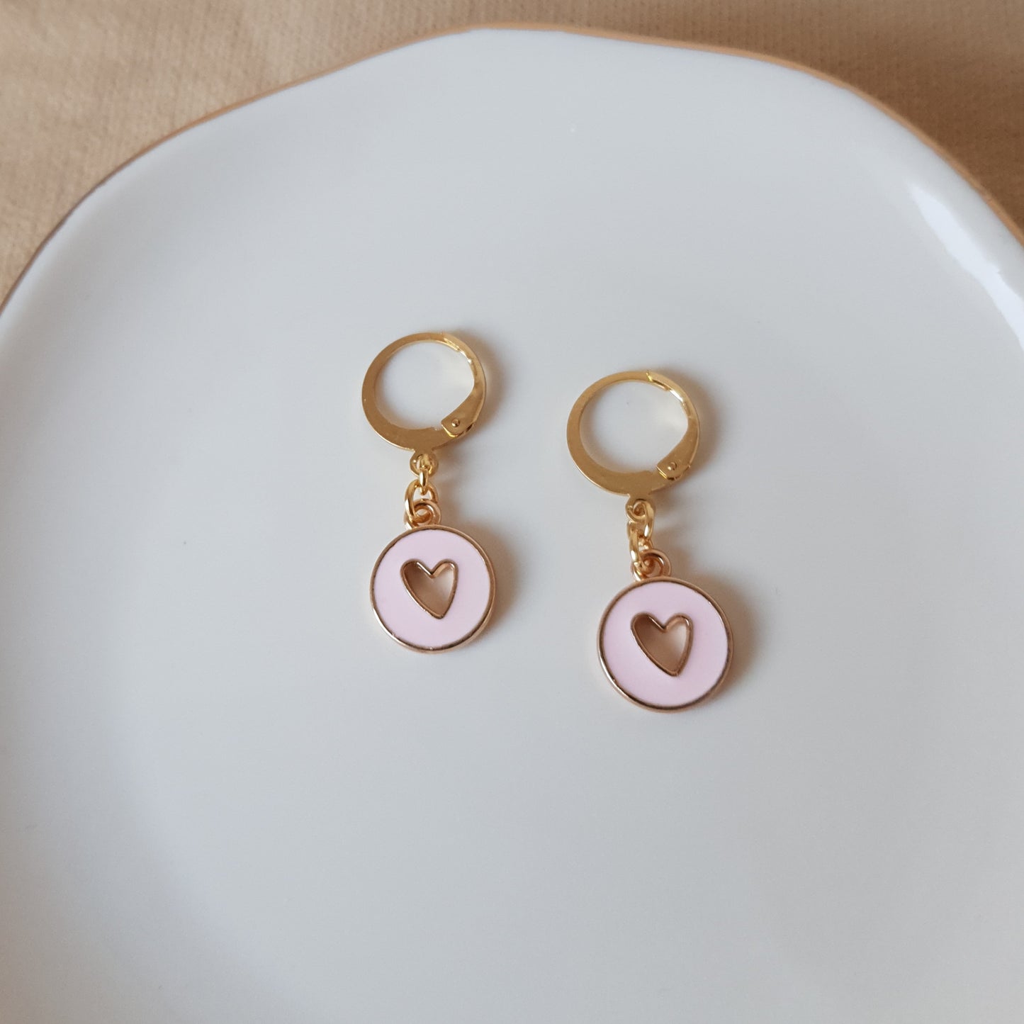 Pink and gold heart dangle earrings