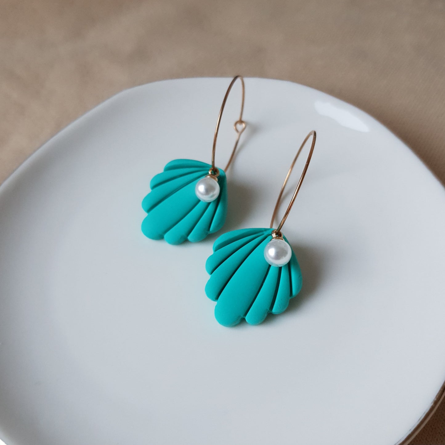 Turquoise shells with pearls