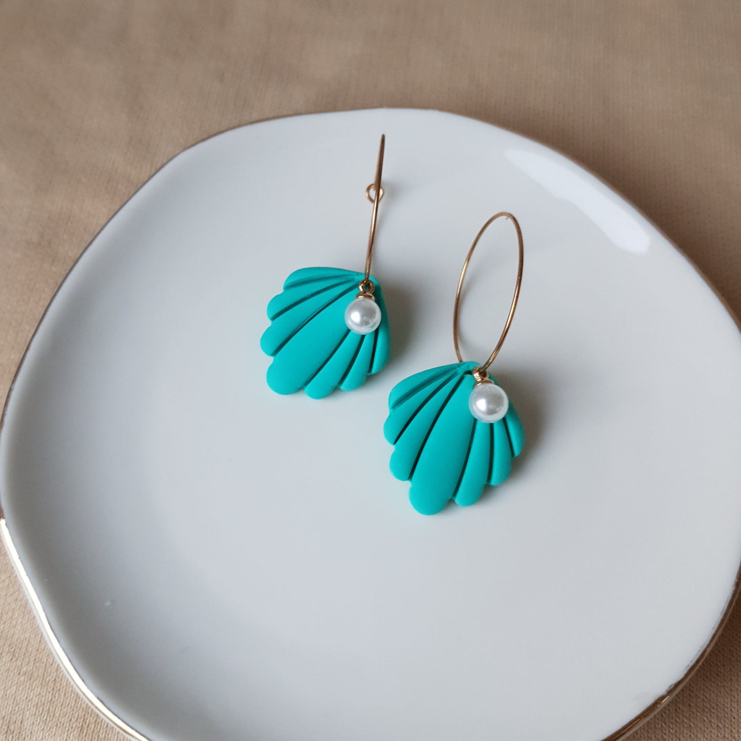 Turquoise shells with pearls