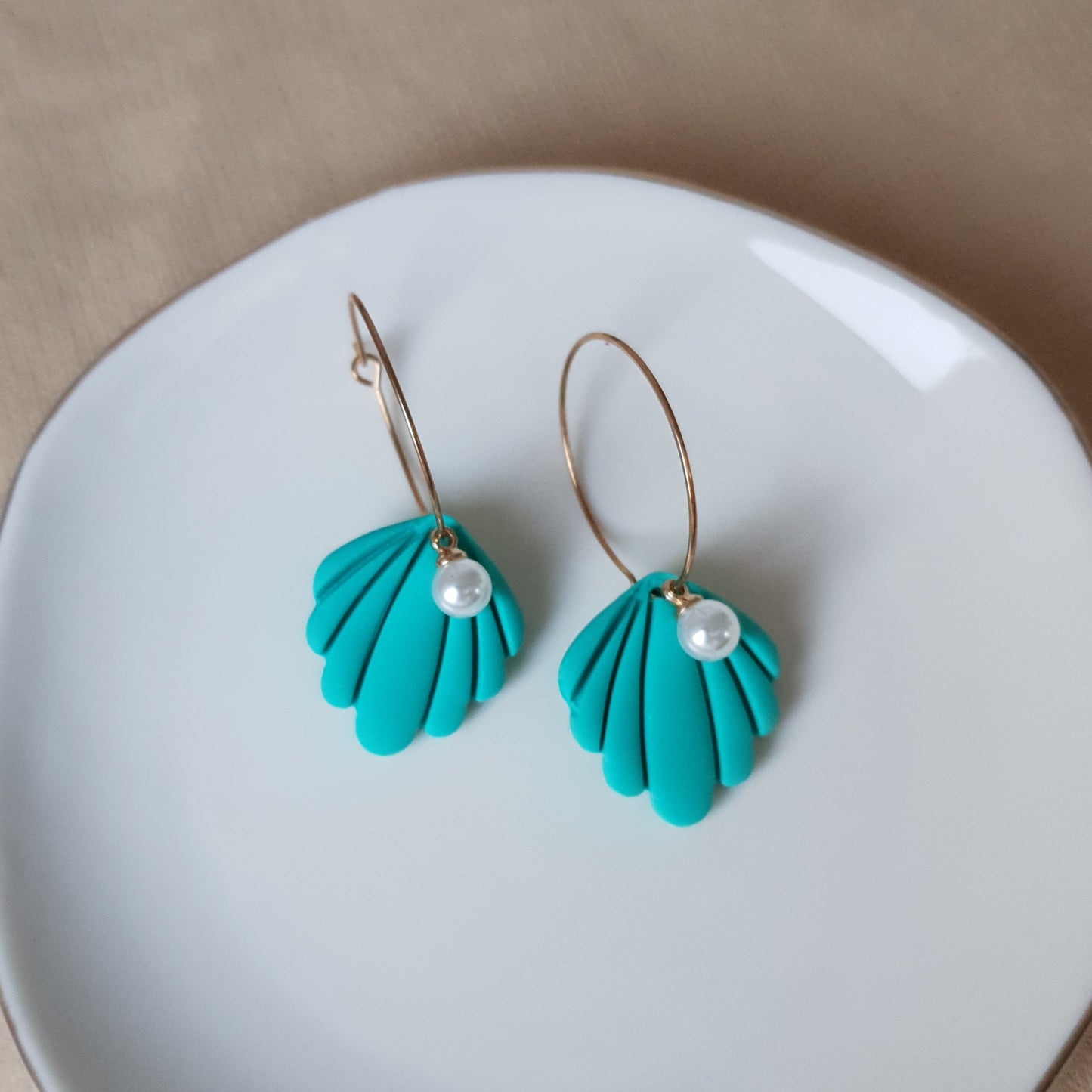 Turquoise shells with pearls