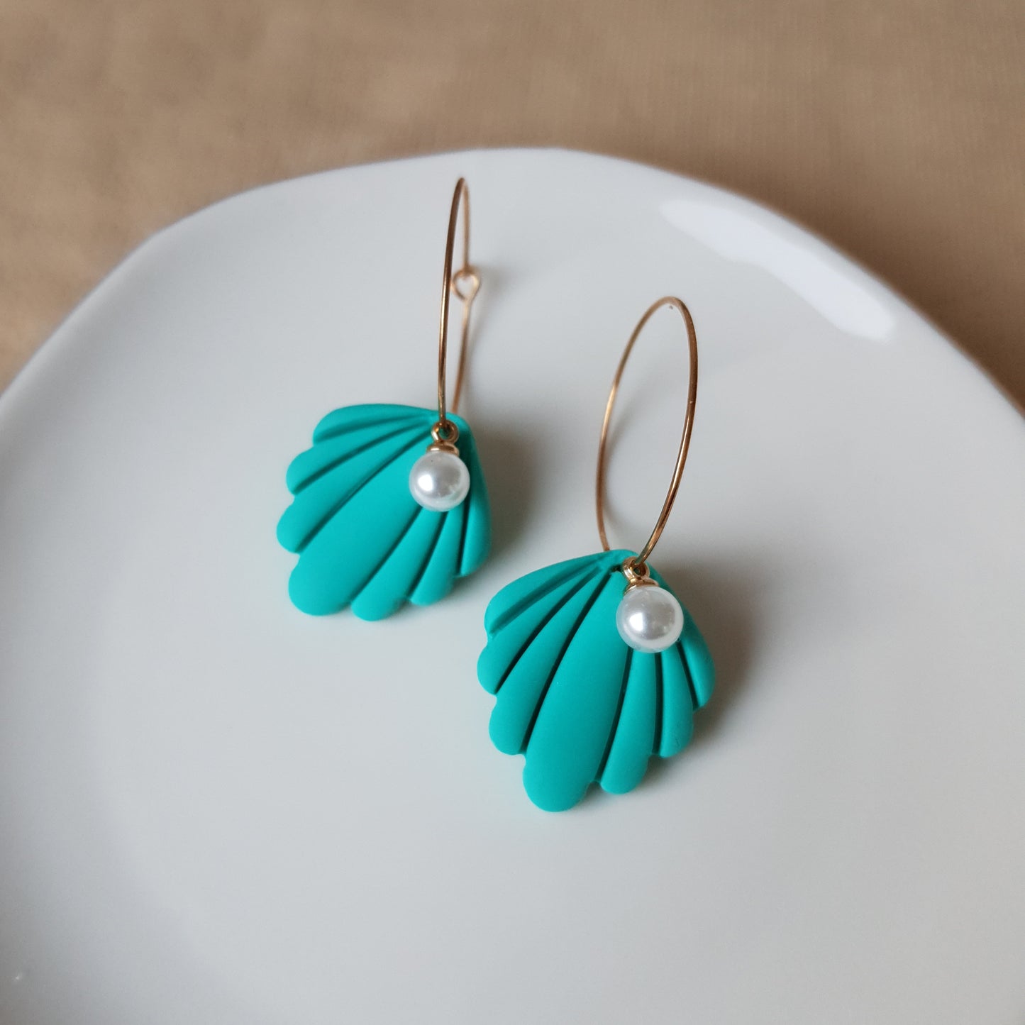 Turquoise shells with pearls