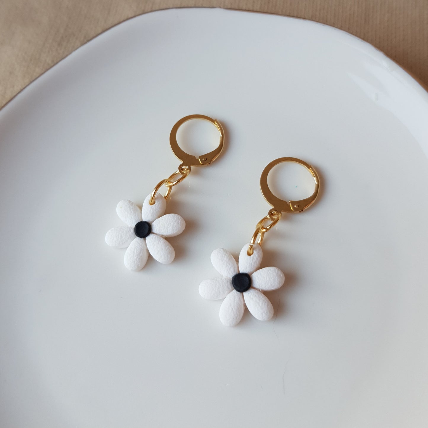 White flowers on hoops