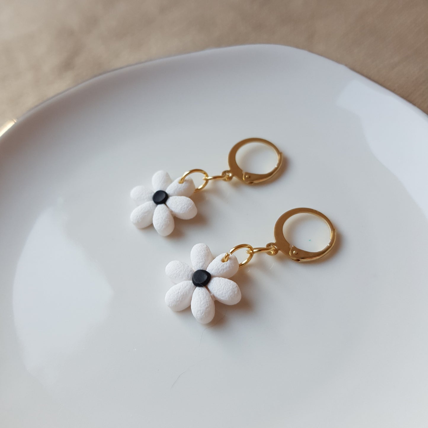 White flowers on hoops