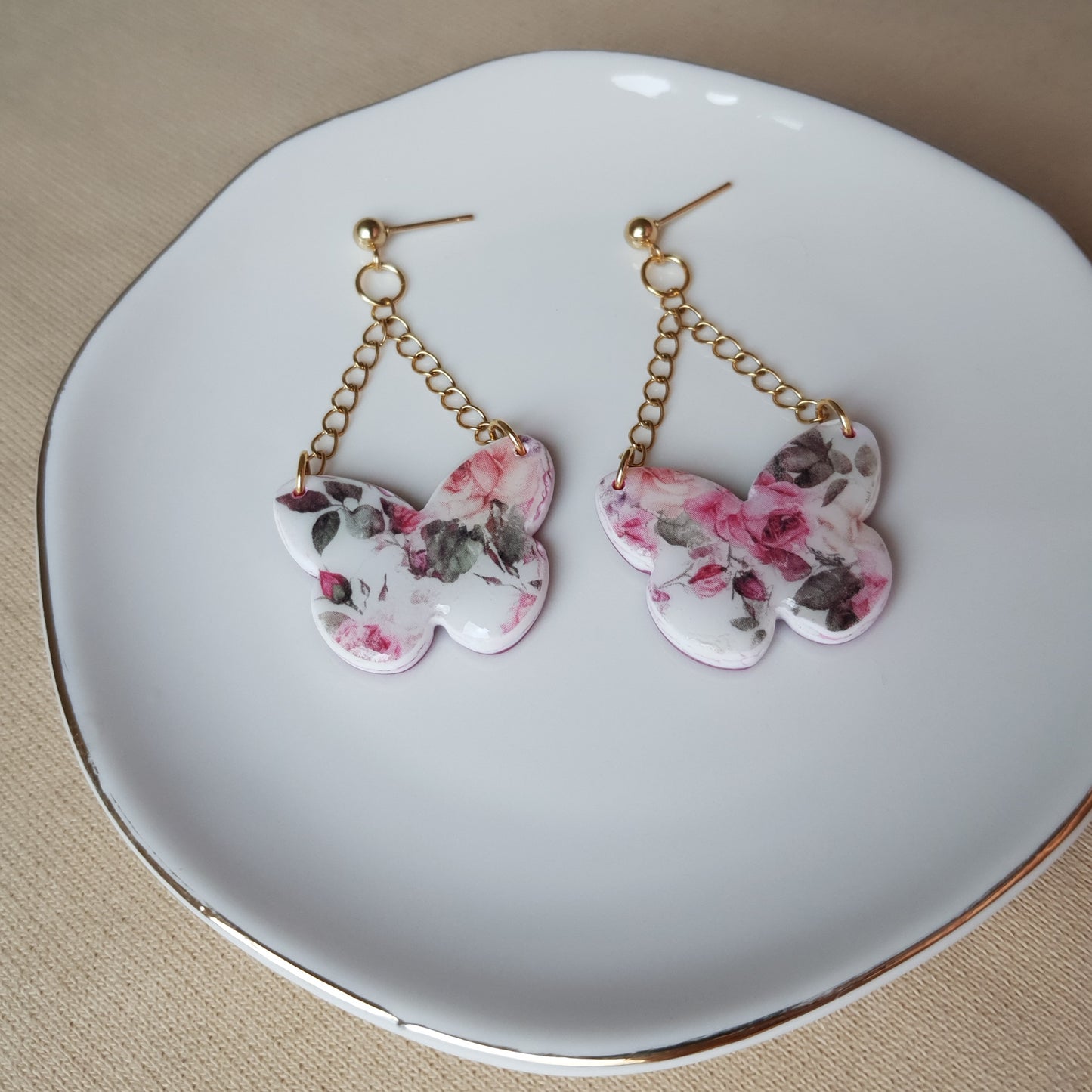 Floral butterfly dangle earrings
