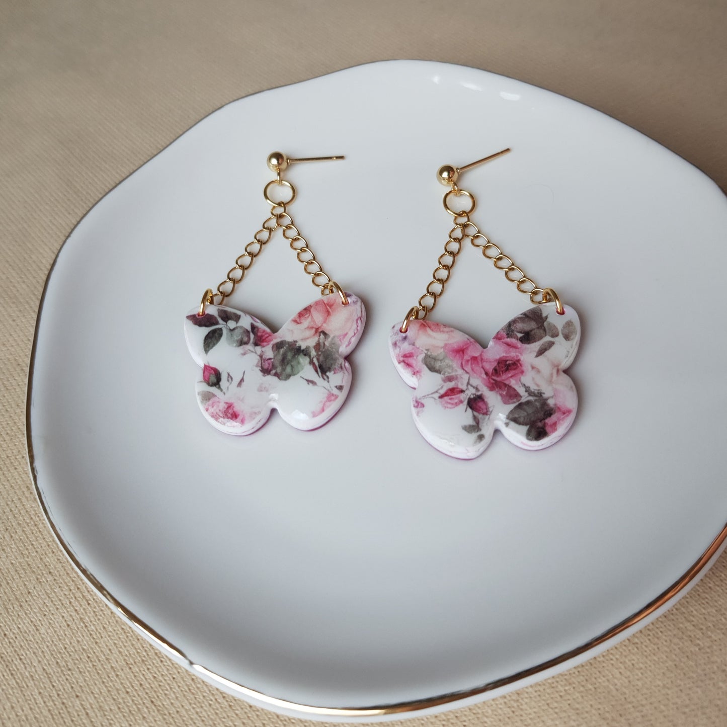 Floral butterfly dangle earrings