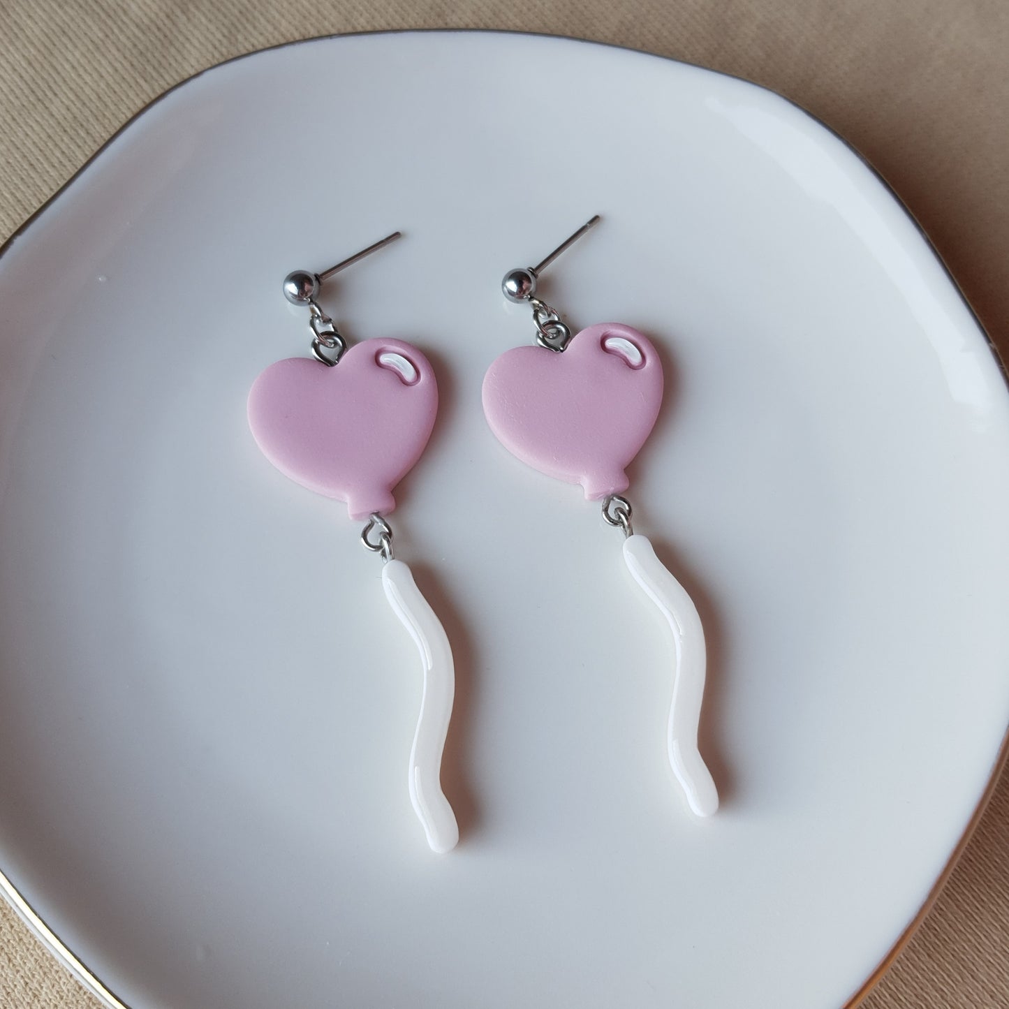 Pink balloon dangly earrings