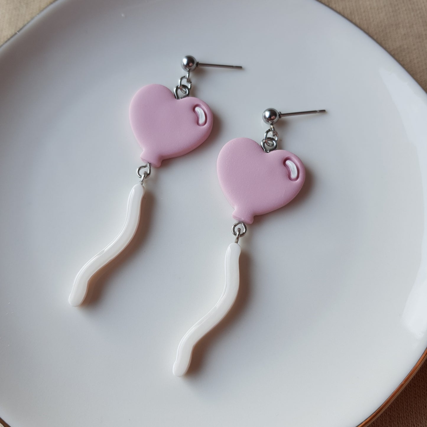 Pink balloon dangly earrings