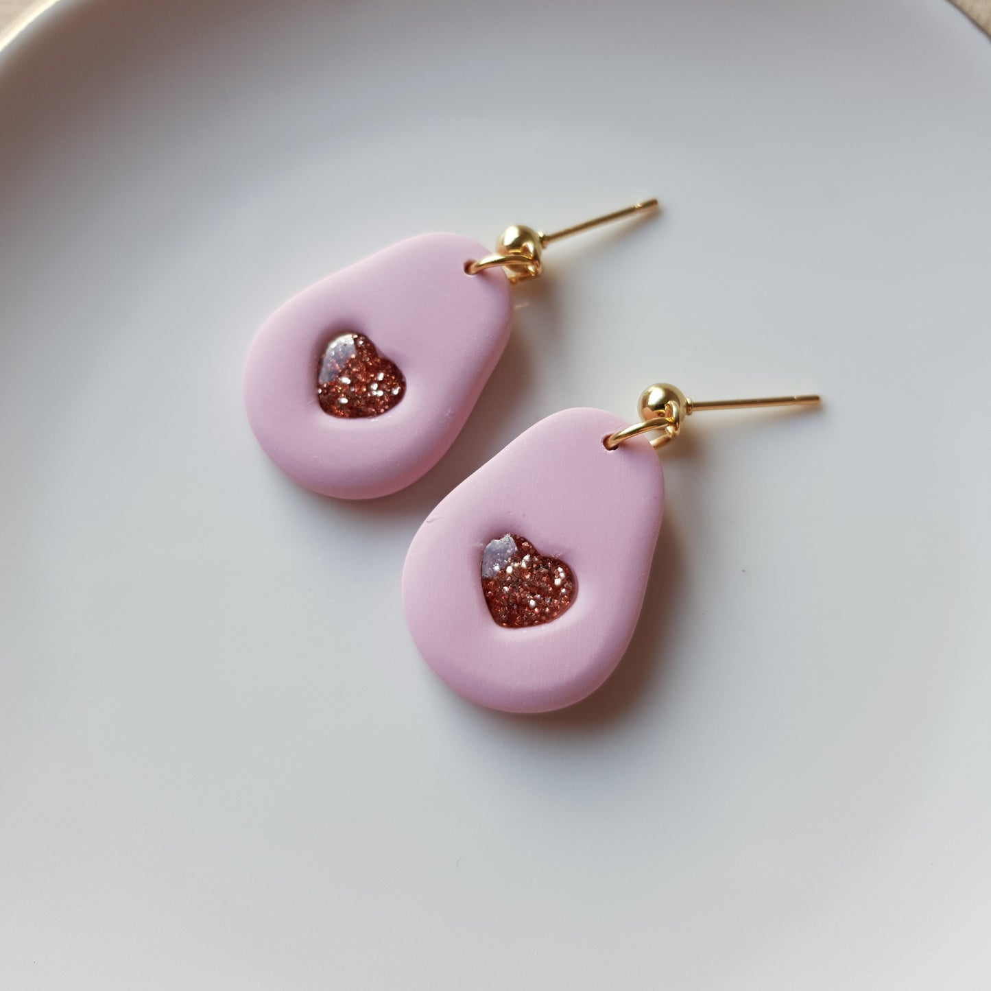 Sparkly heart avocado earrings