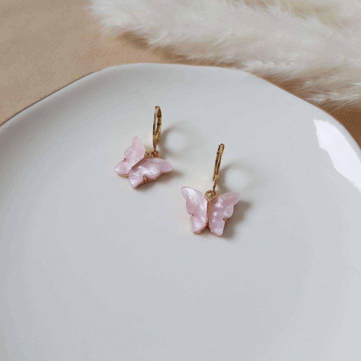 Pink butterfly earrings
