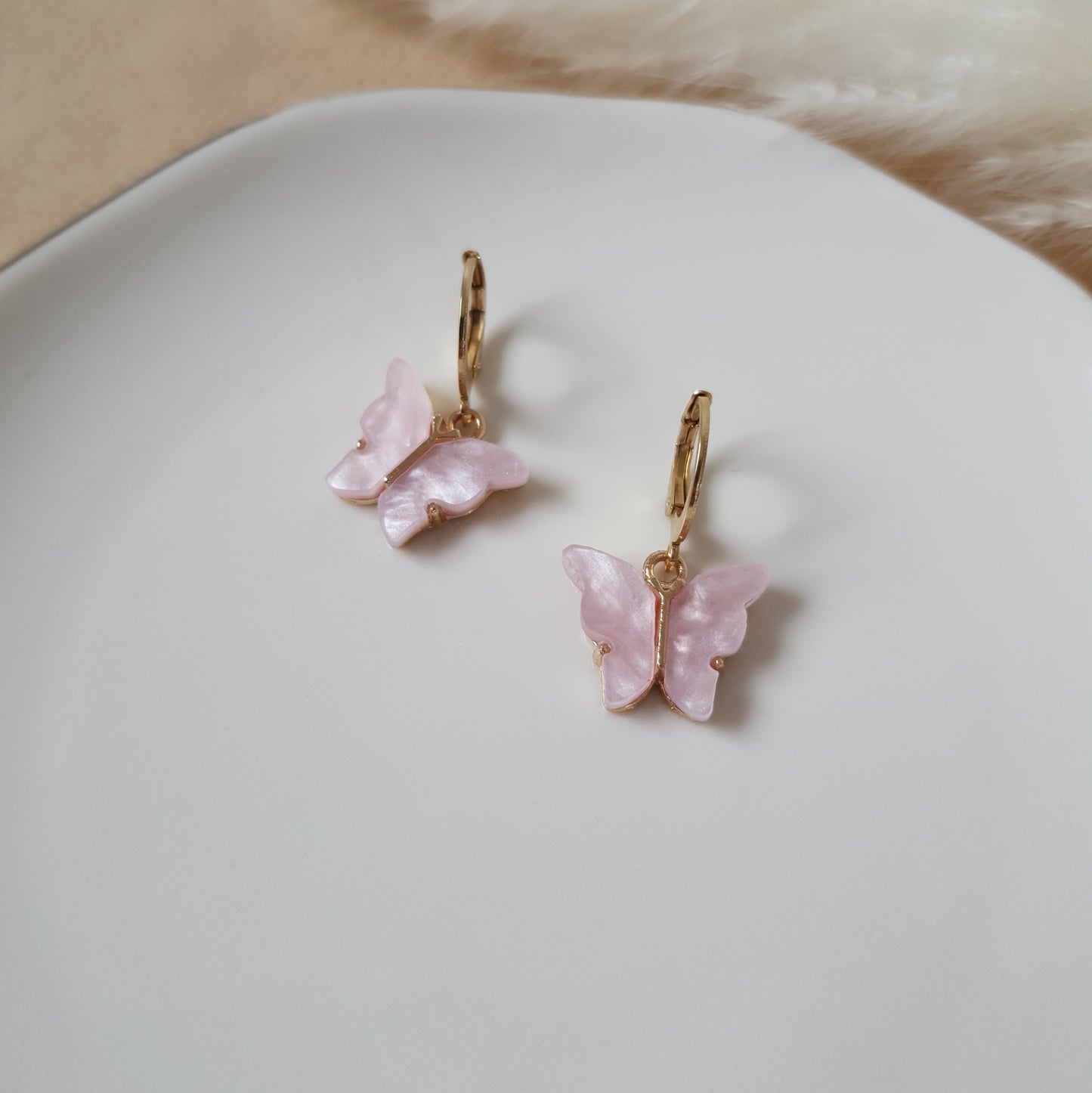 Pink butterfly earrings