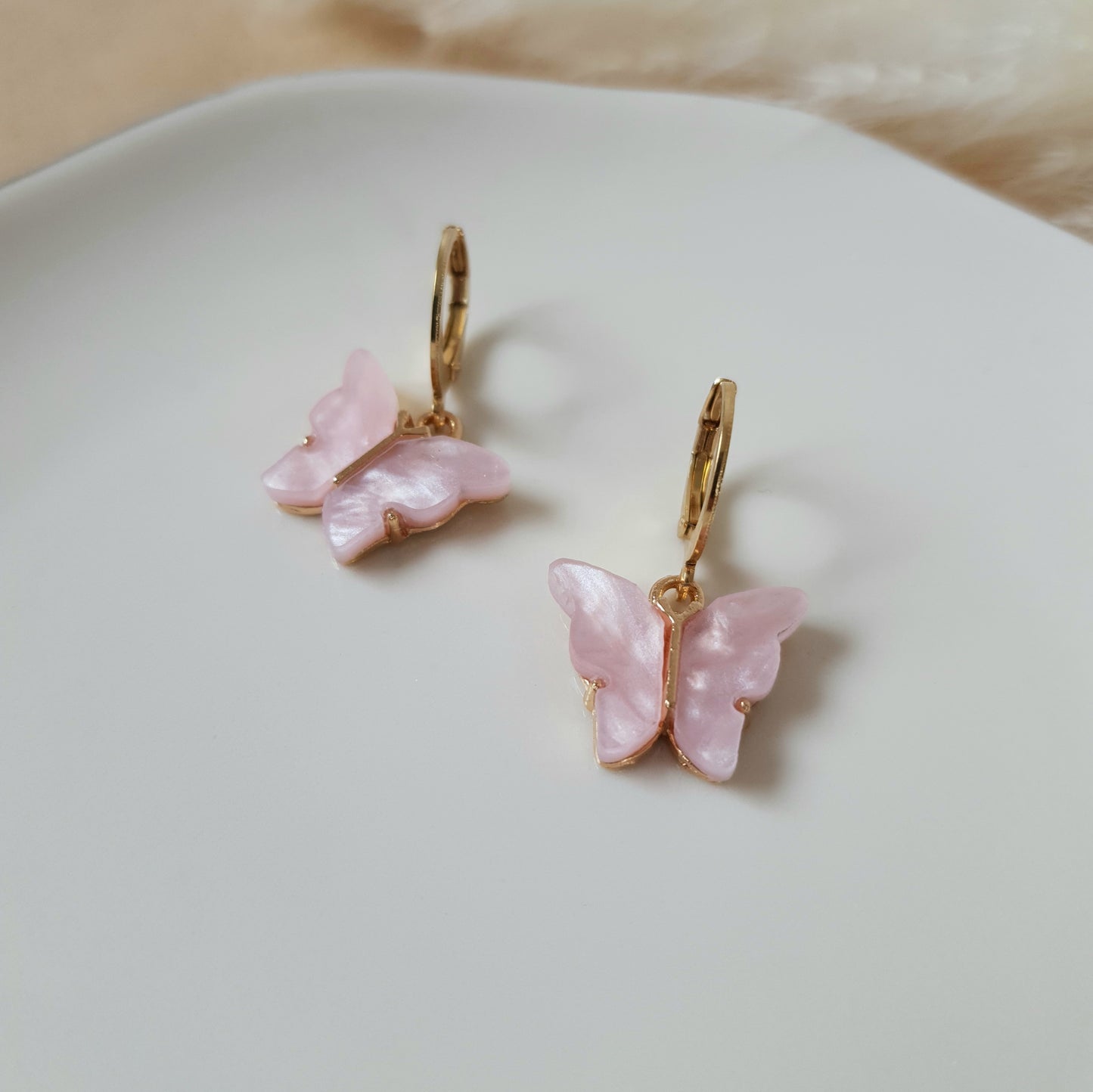 Pink butterfly earrings