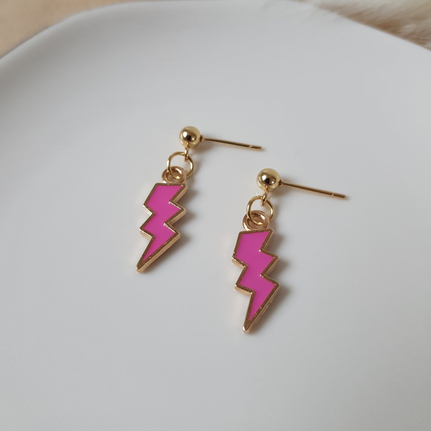 Pink lightning bolt earrings