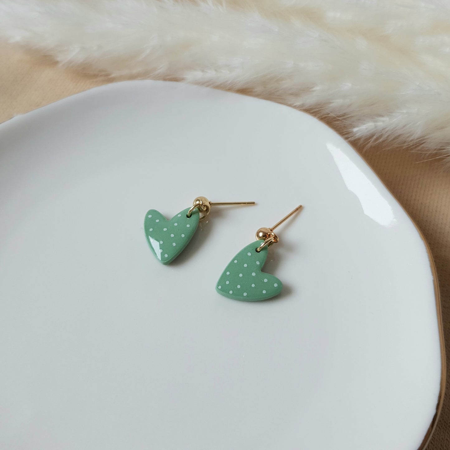 Green spotted dangly hearts