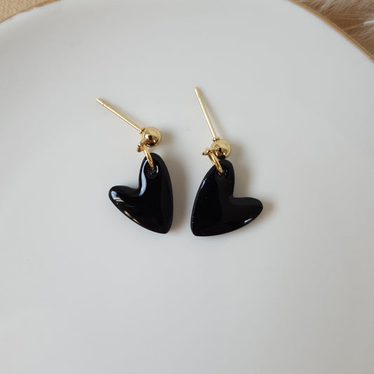 Black glossy dangle hearts