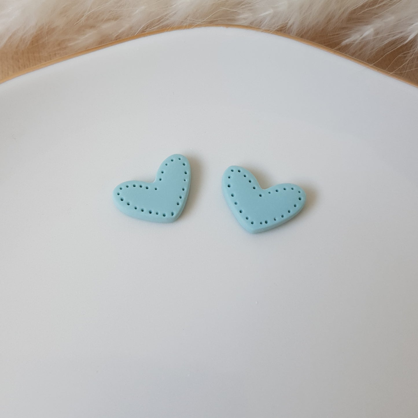 Detailed heart earrings