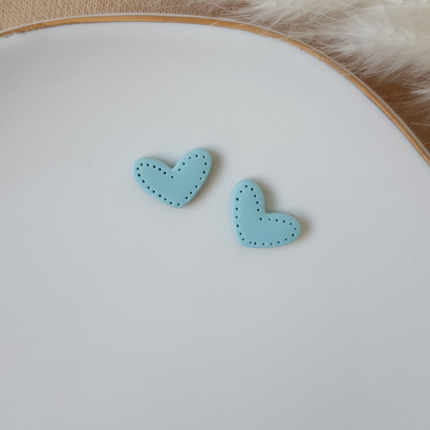 Detailed heart earrings
