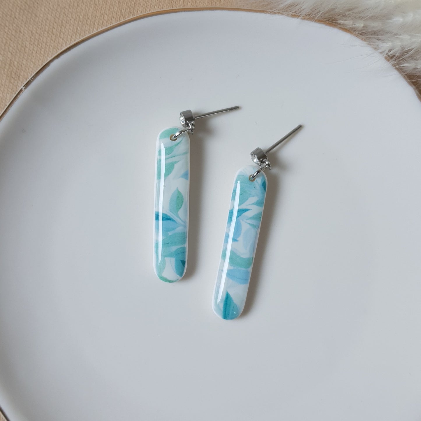 Oval blue leaf earrings