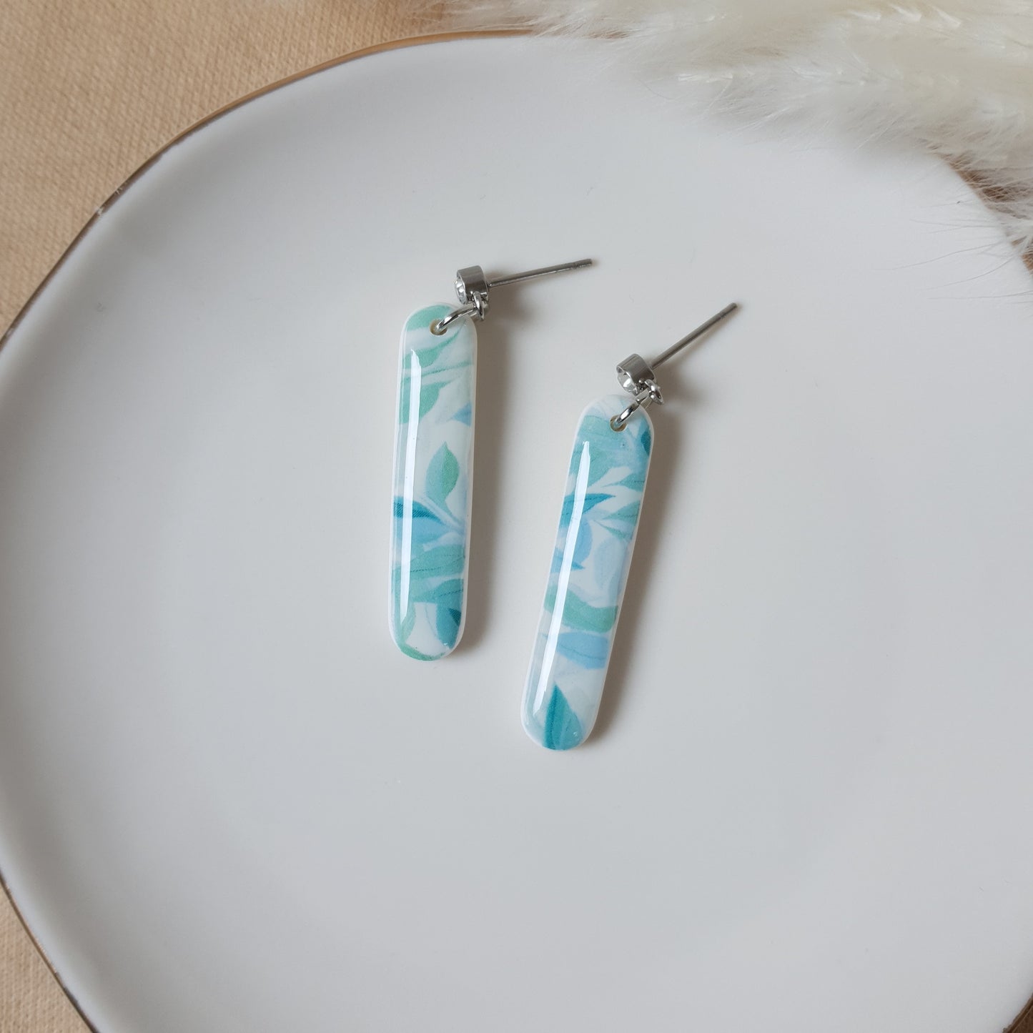 Oval blue leaf earrings