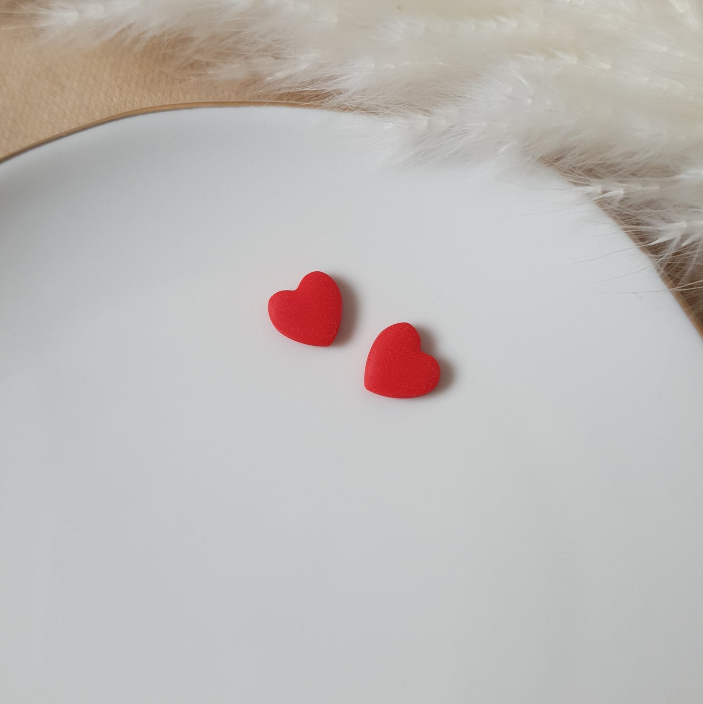Mini red heart stud earrings
