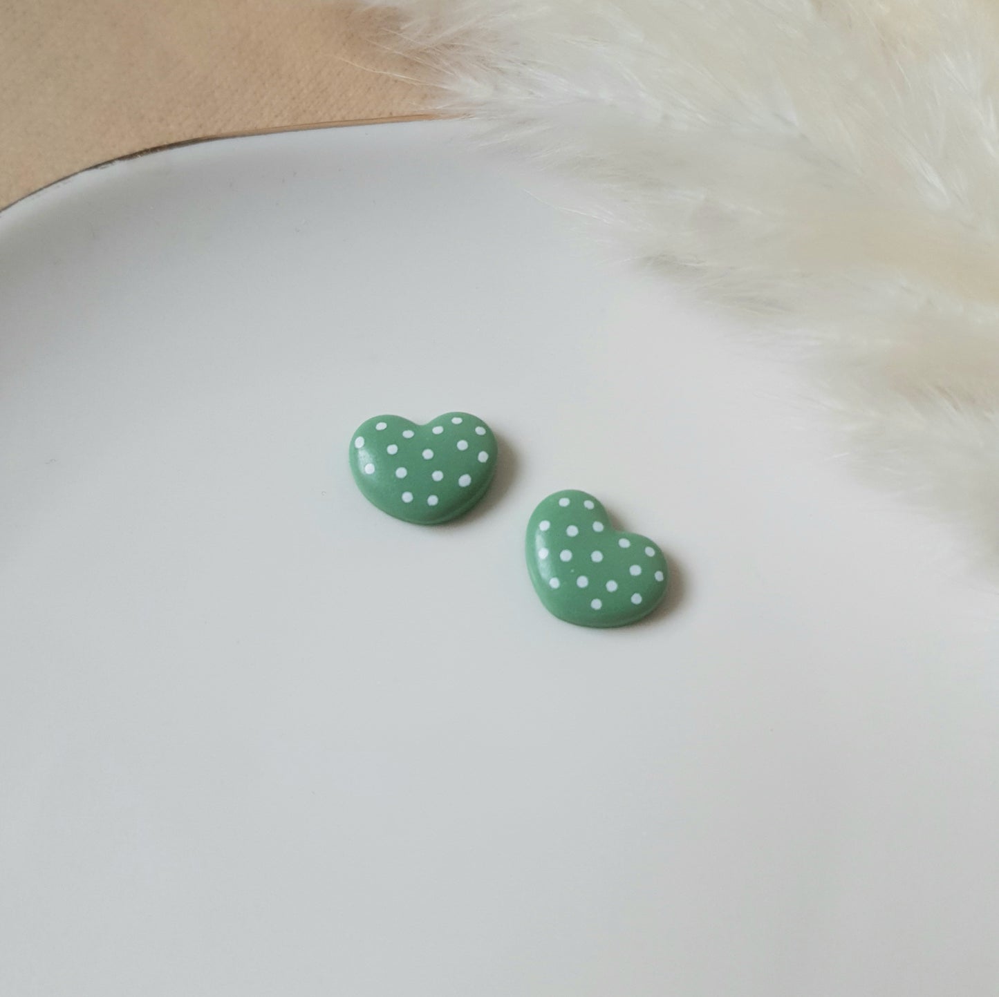 Green hearts stud earrings