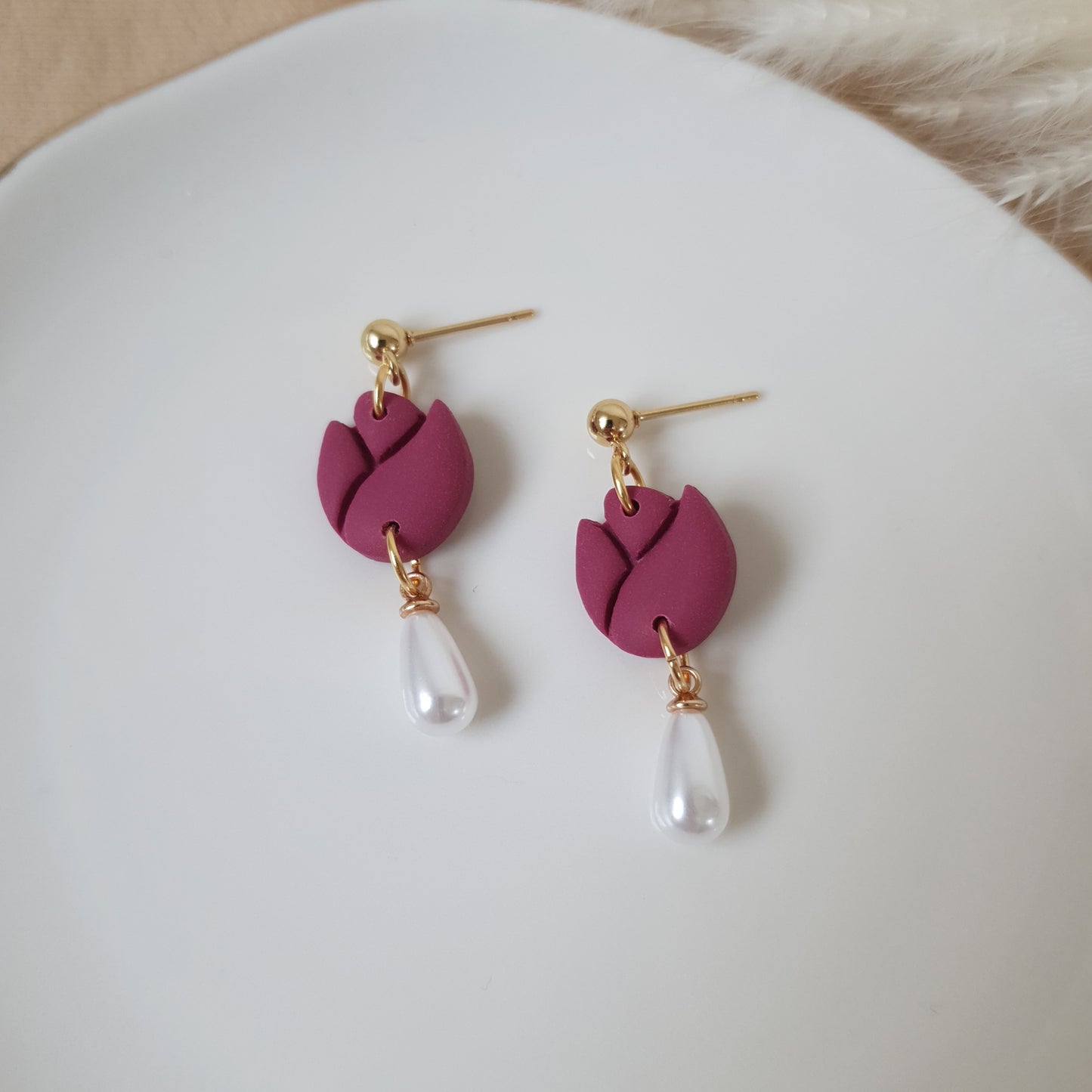 Purple tulips with pearl drops