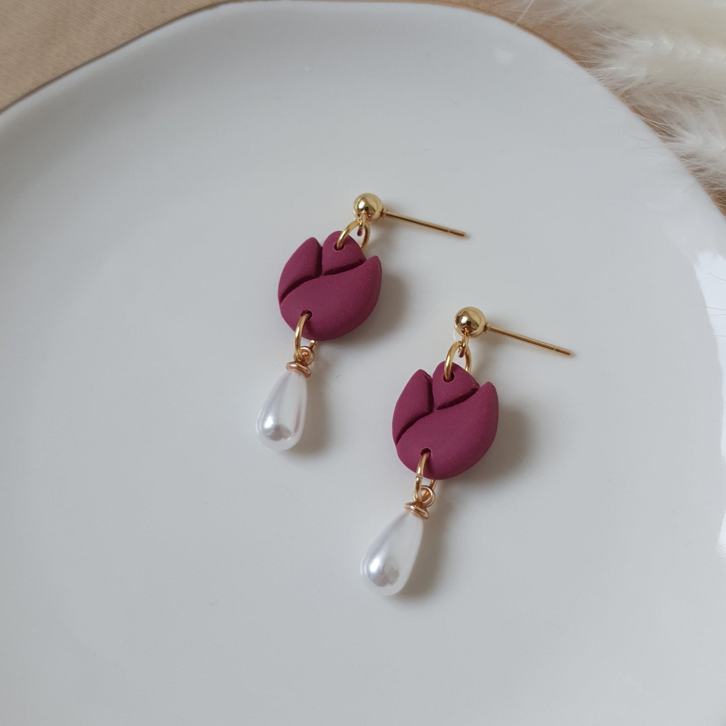 Purple tulips with pearl drops