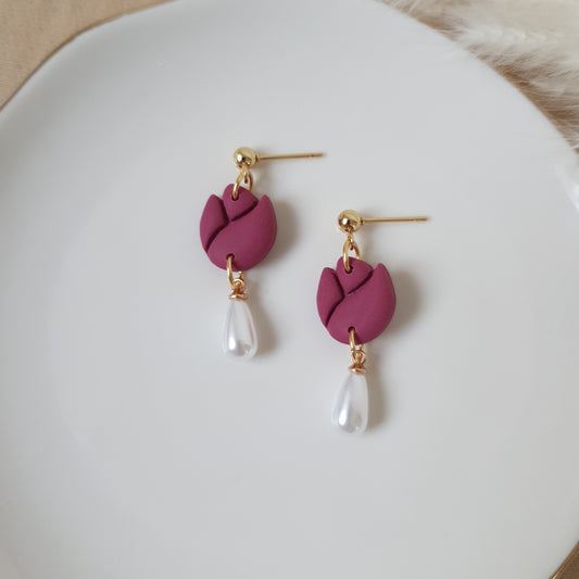 Purple tulips with pearl drops