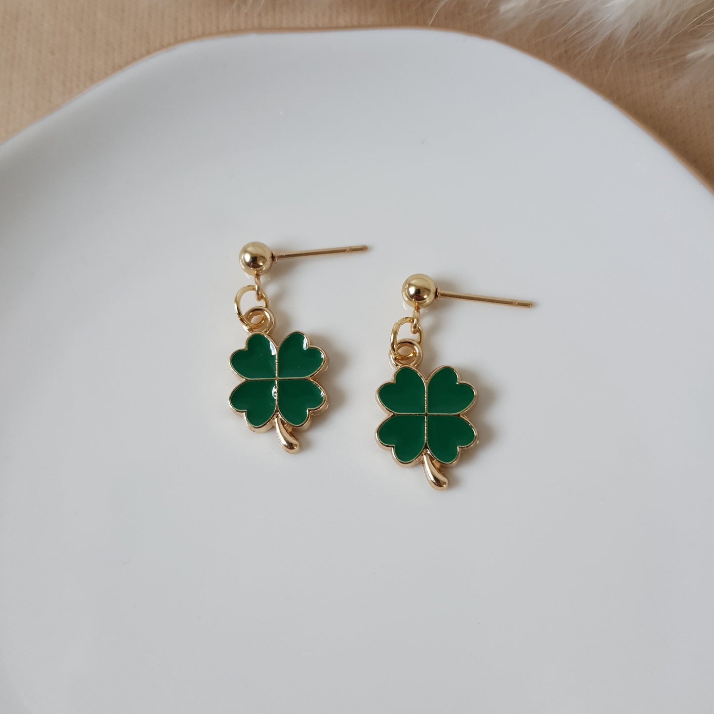 Green four leaf clover earrings