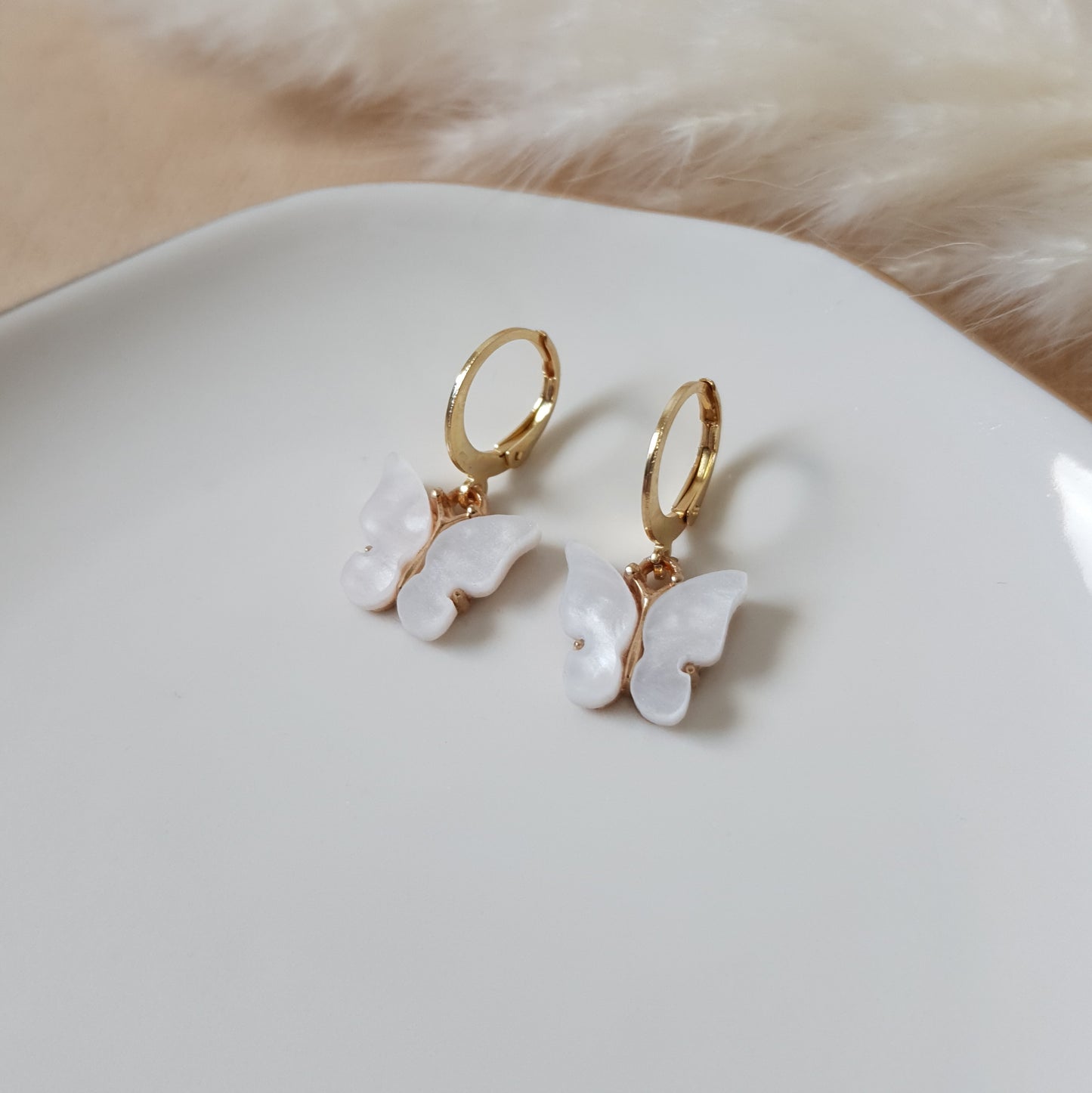 White butterfly earrings
