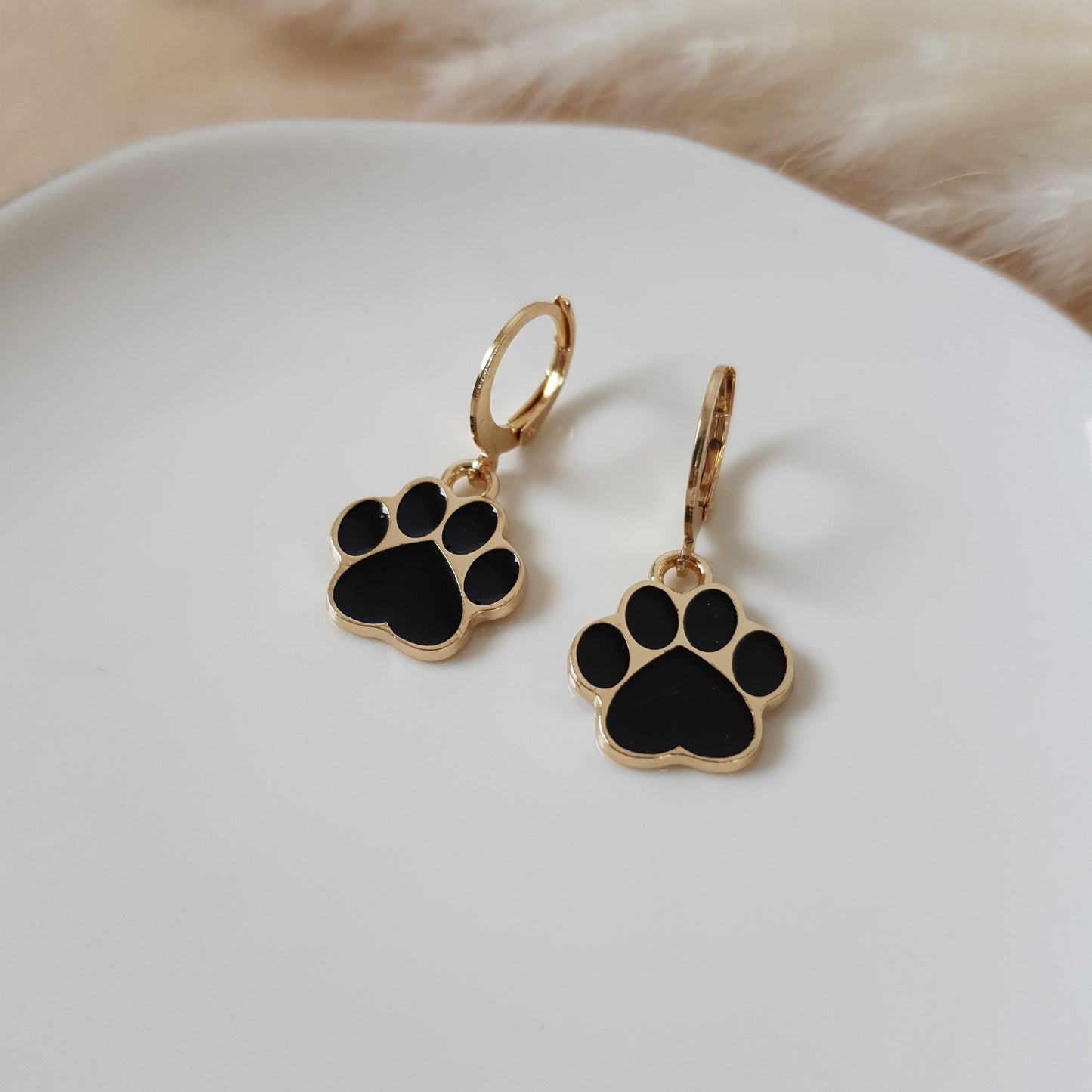 Black paw earrings