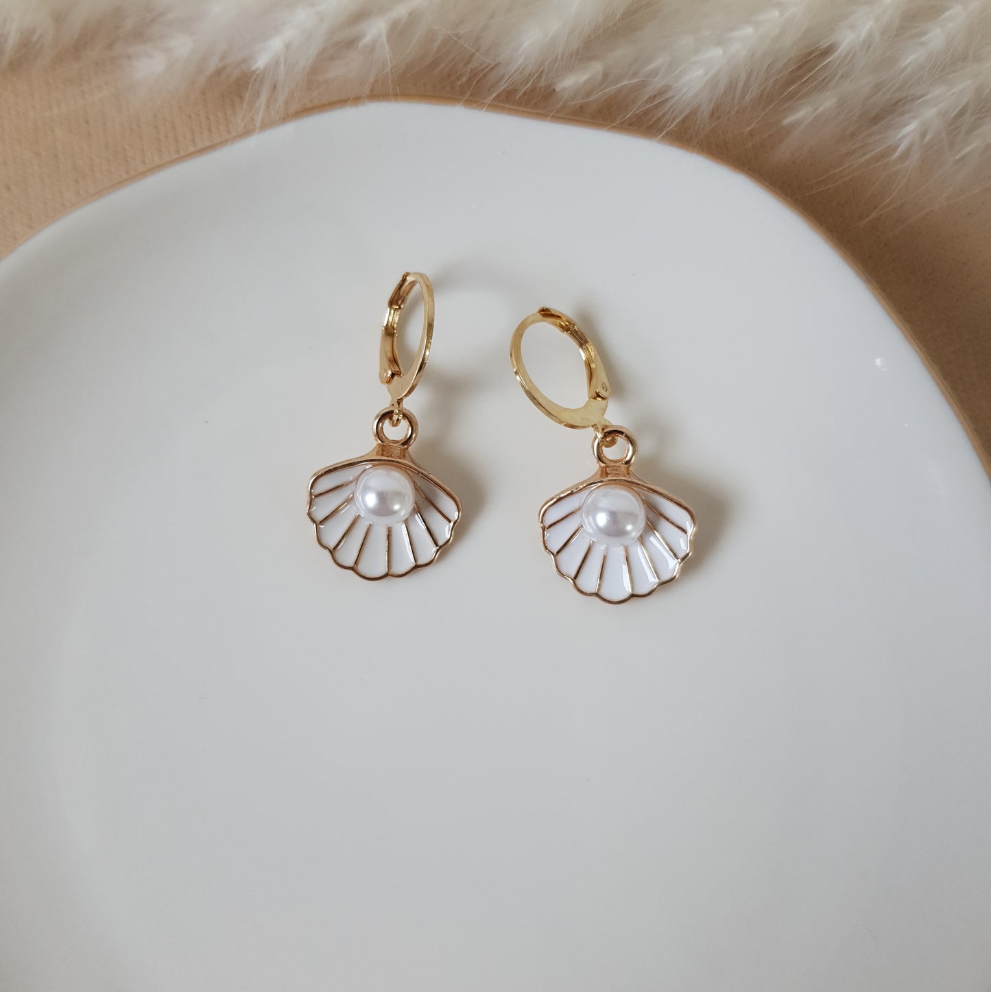 White sea shells with pearls