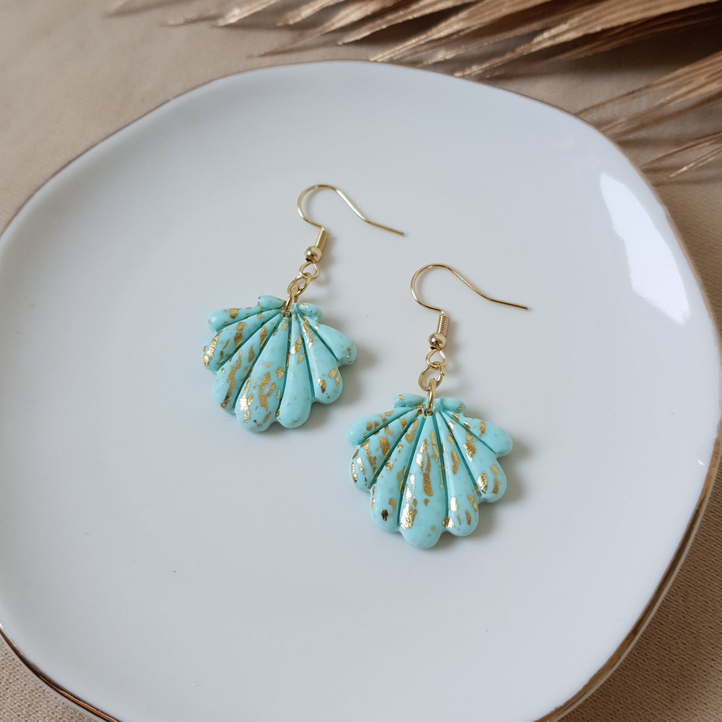 Gold speckled minty sea shell errings