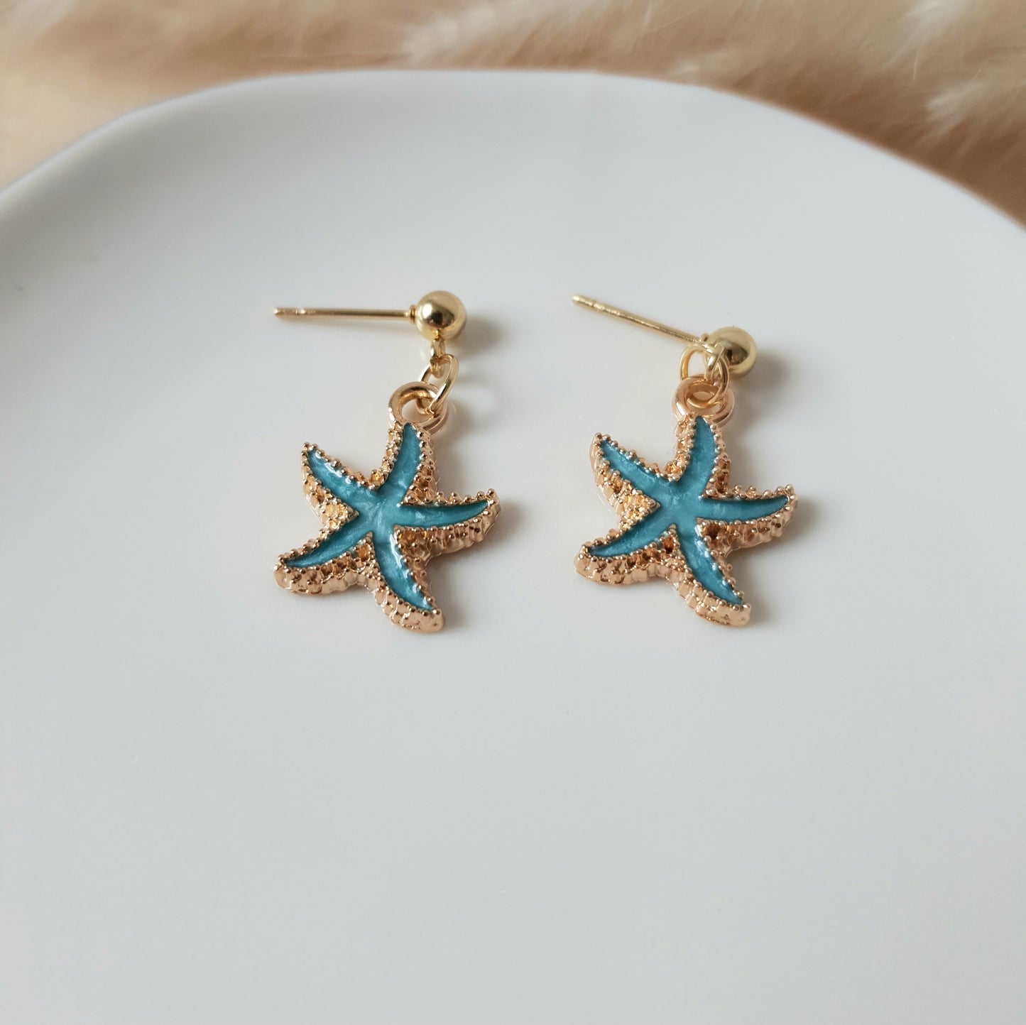Turquoise and gold sea star earrings