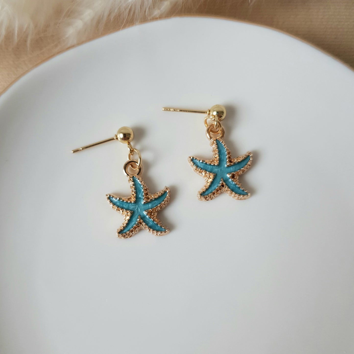 Turquoise and gold sea star earrings